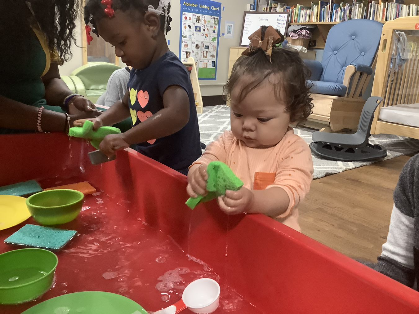 Toddlers at a sensory table