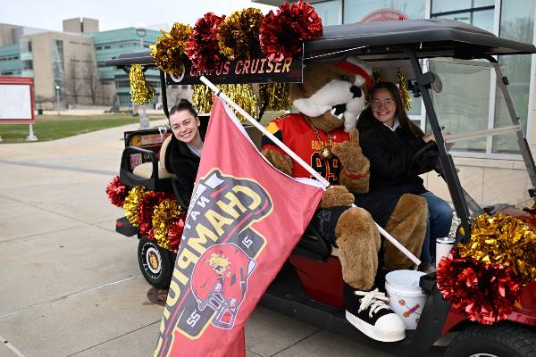 Ferris State students on the campus cruiser during One Day for Dawgs