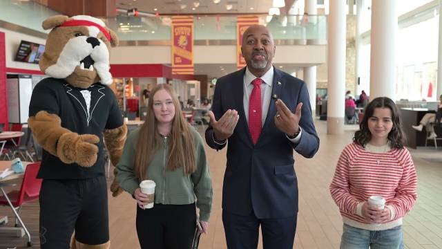 President Pink and some students thank donors for one day for dawgs gifts