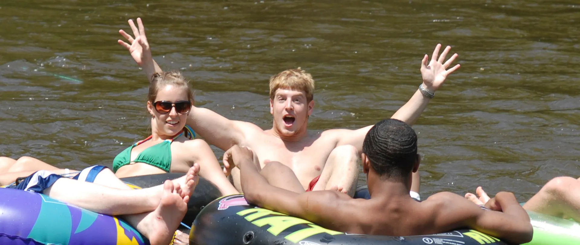 Friends tubing down the Muskegon River