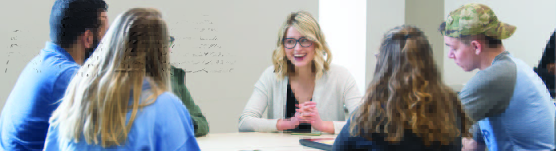 Students sitting in a circle in discussion