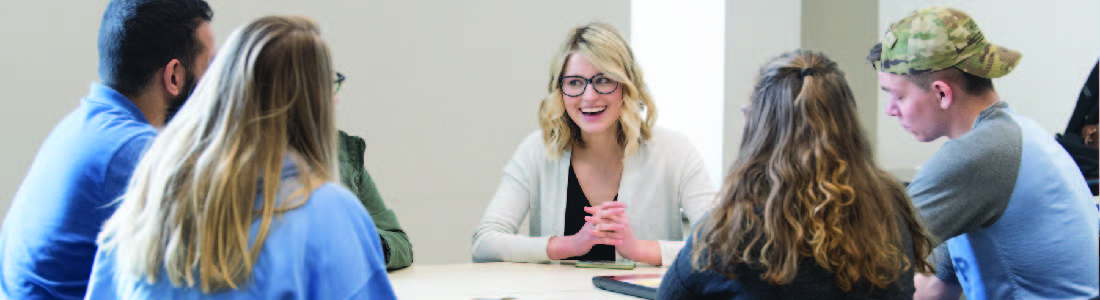 Students sitting in a circle in discussion