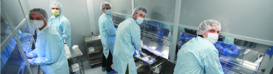 Five students working in pharmacy lab