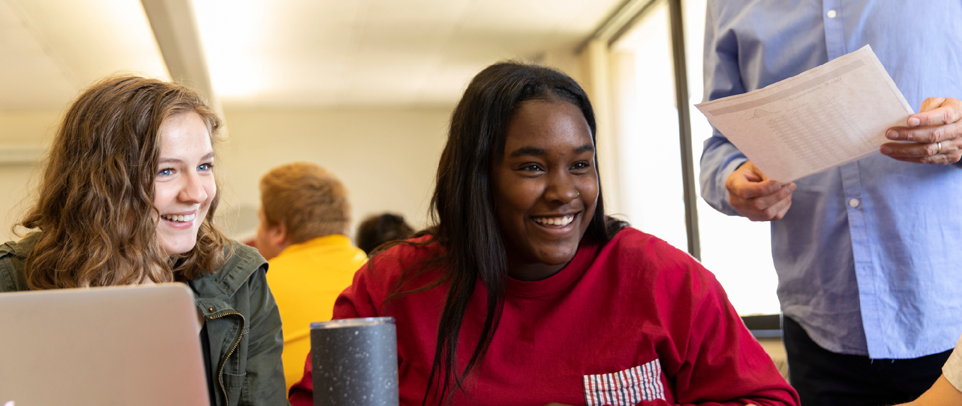 Student group smiling at event