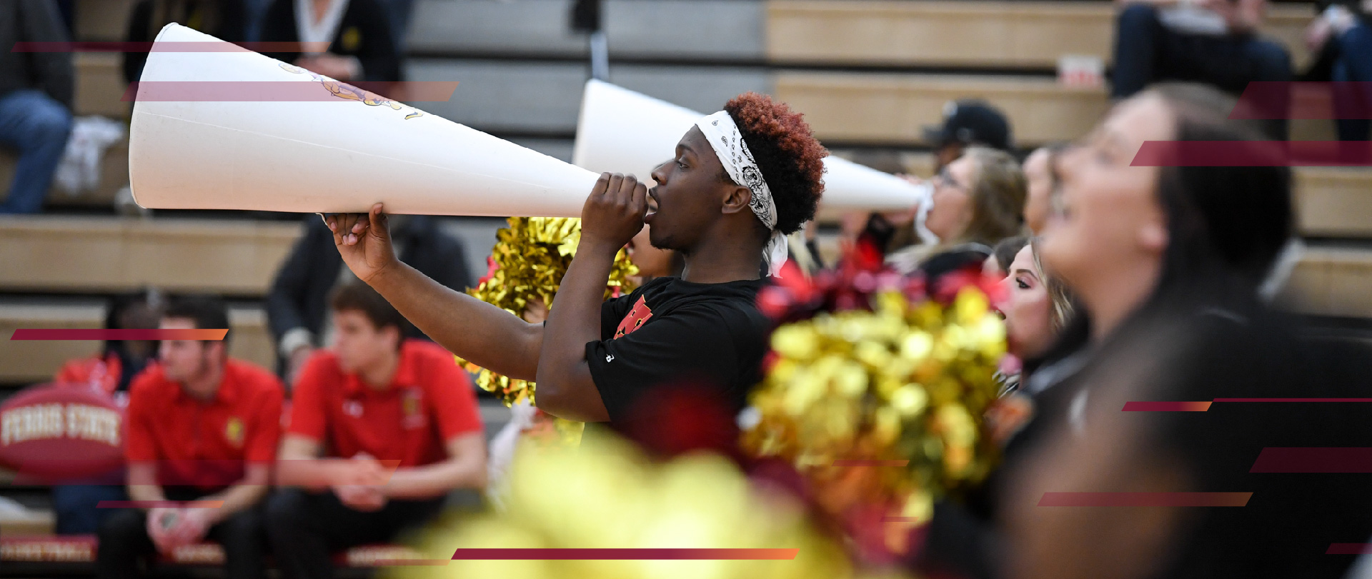 Student cheering on the Bulldogs at an athletics event