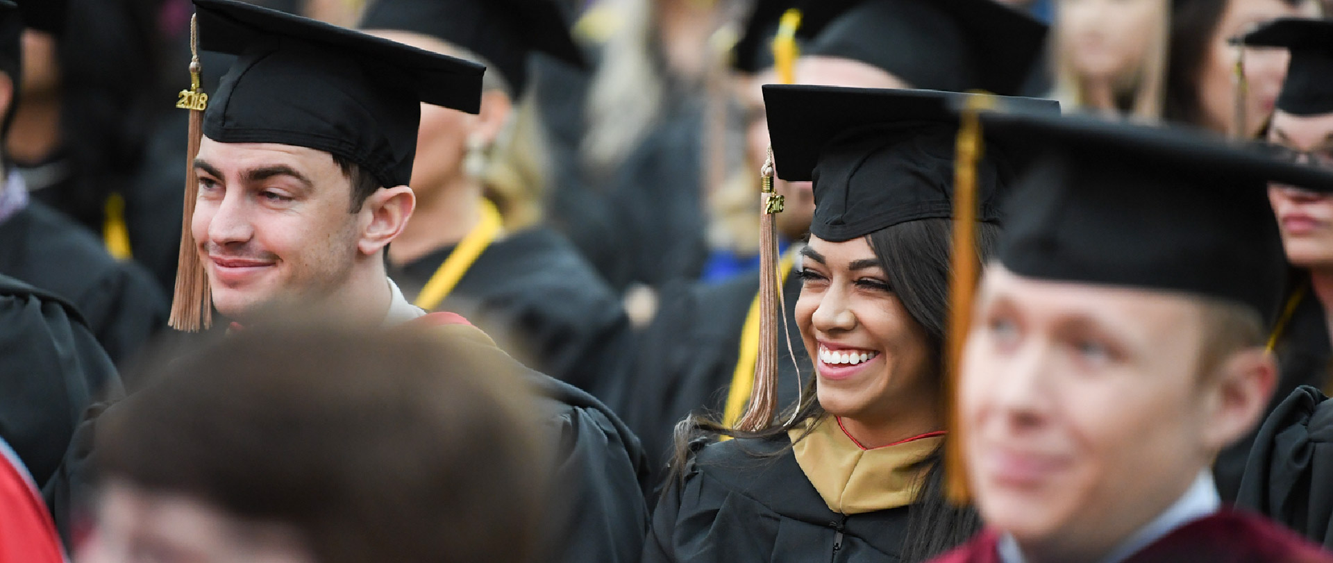Students at a commencement ceremony
