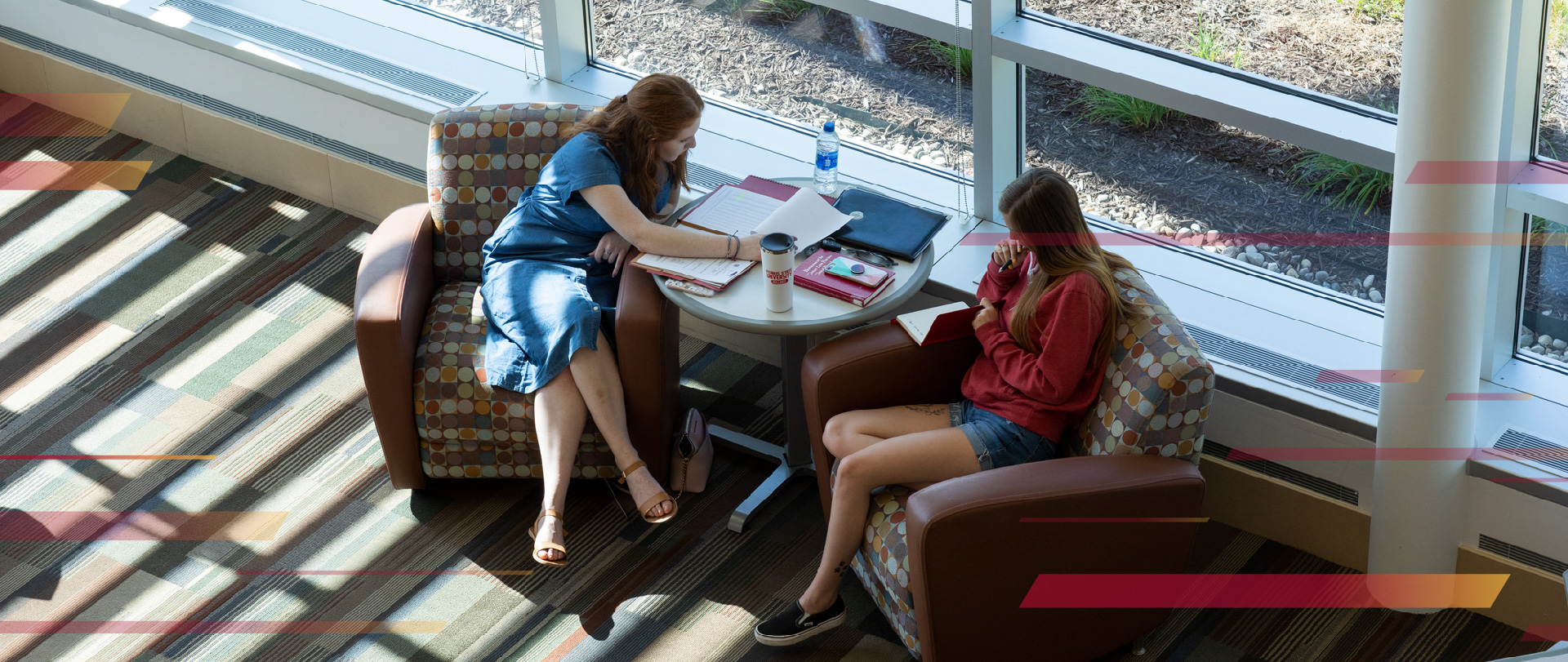 Students talking at a table