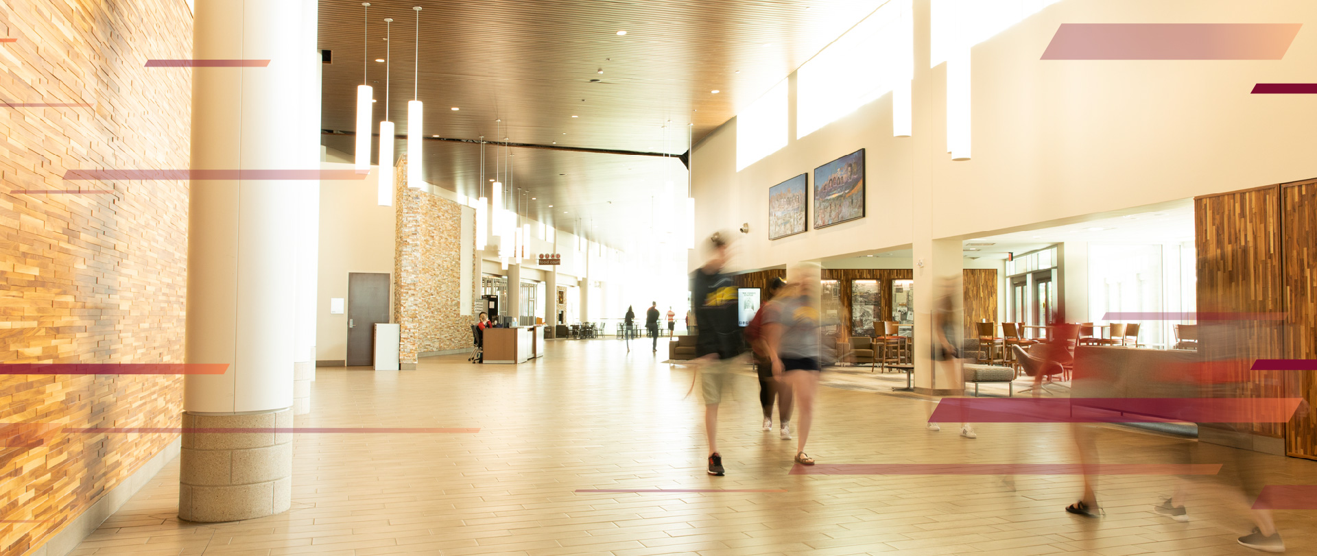 students in university center and the Ferris State University seal in the background