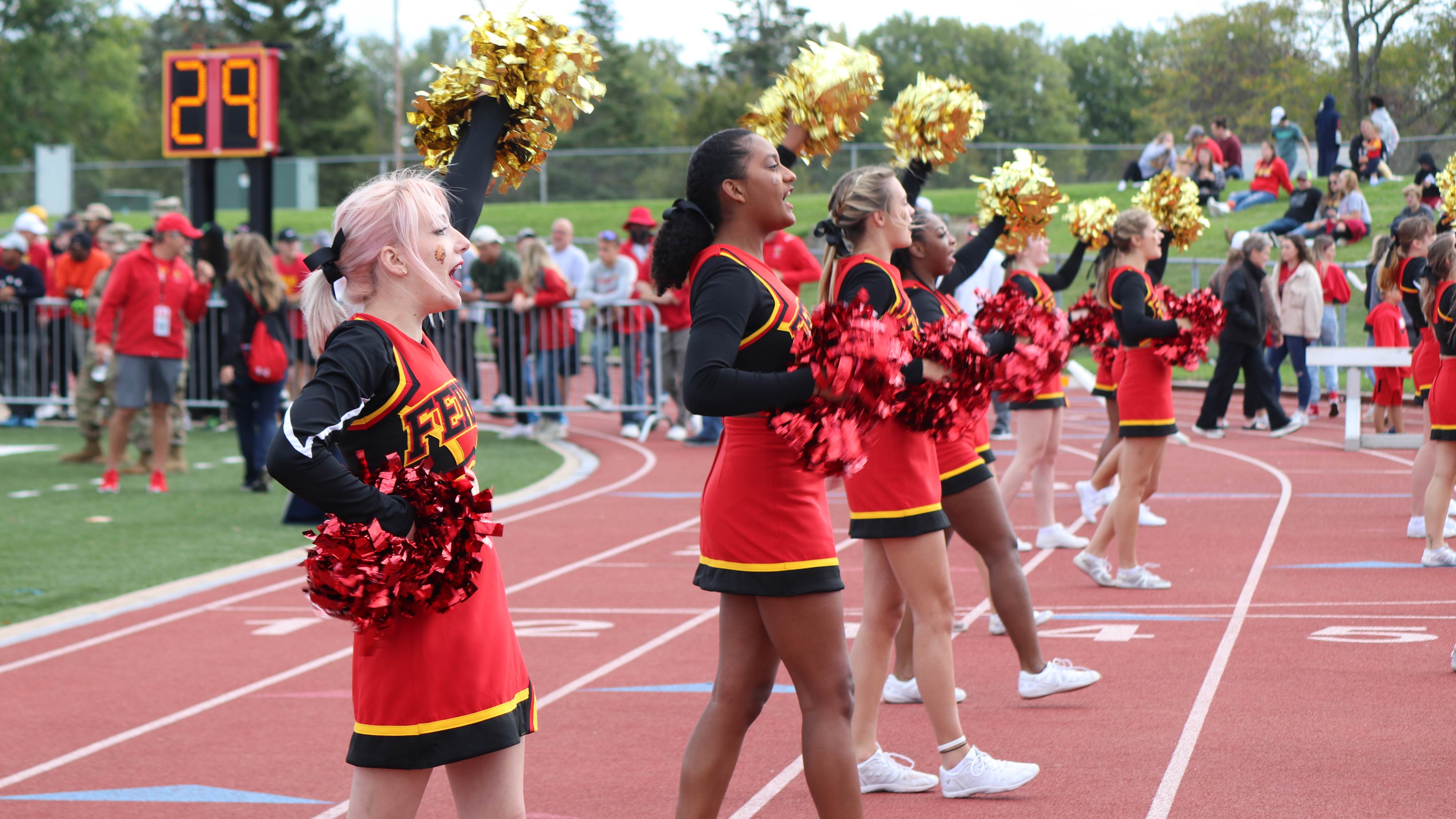Cheerleaders on sideline at Ferris