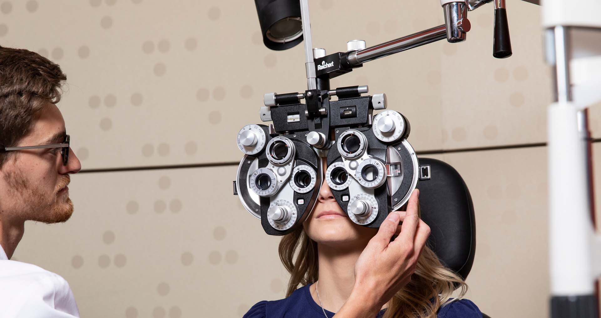 Student completing an eye exam