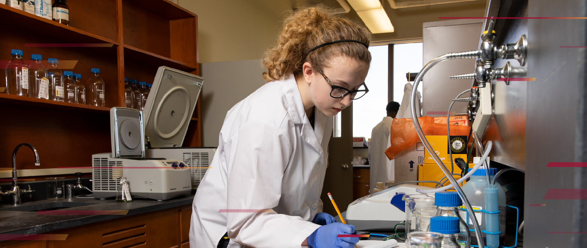 Student using lab equipment