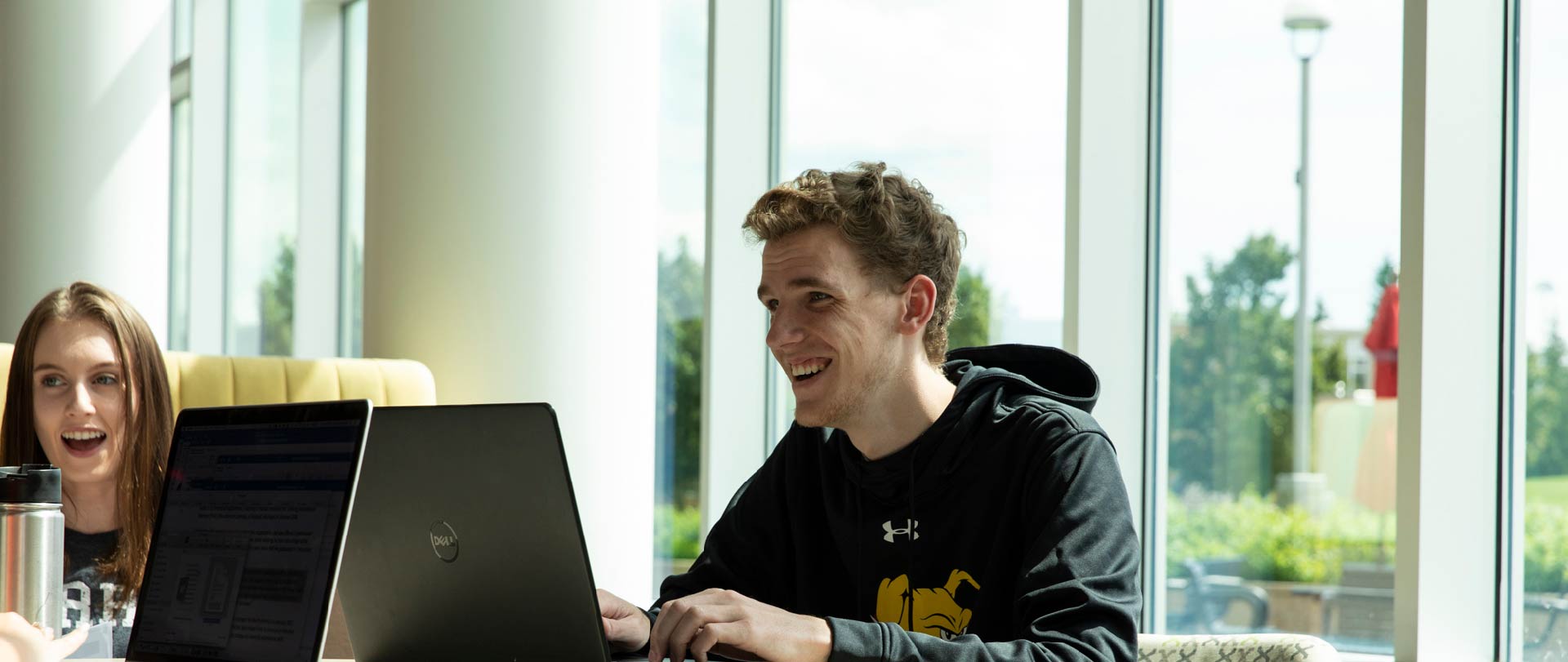 Students using a computer in the David L. Eisler Center at Ferris State University