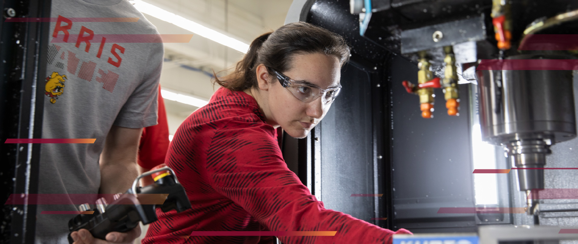 College of Engineering Technology student using industrial machinery