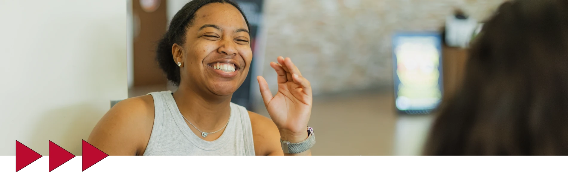 student posing on the campus of Ferris State University