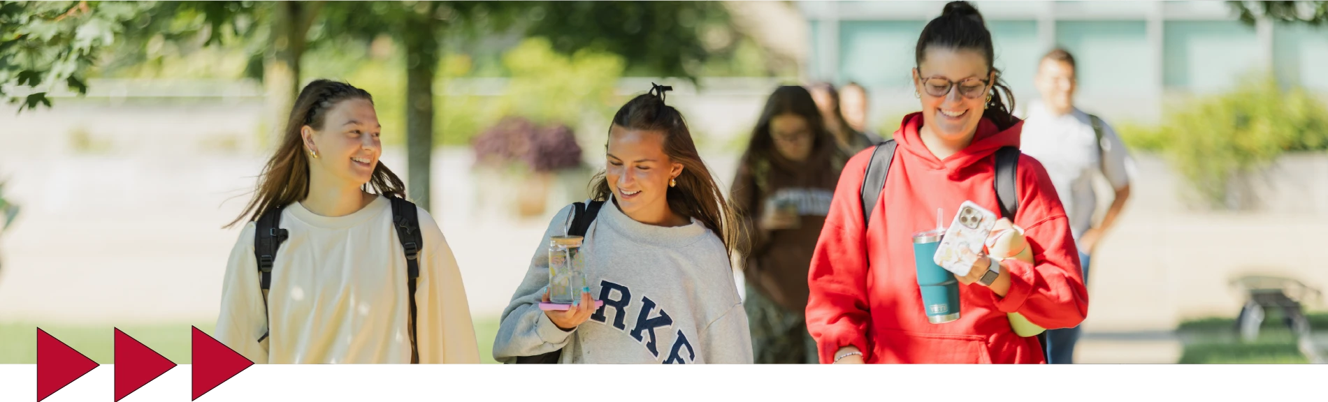 student posing on the campus of Ferris State University