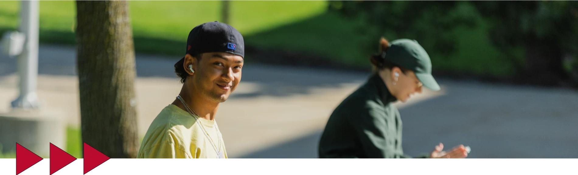 student posing on the campus of Ferris State University
