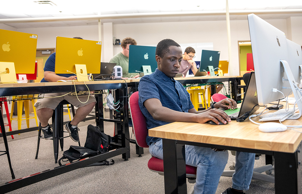 Student working with a computer