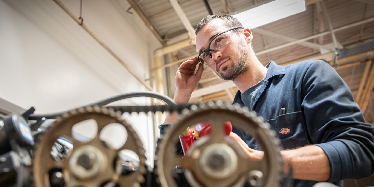 Student working on equipment.