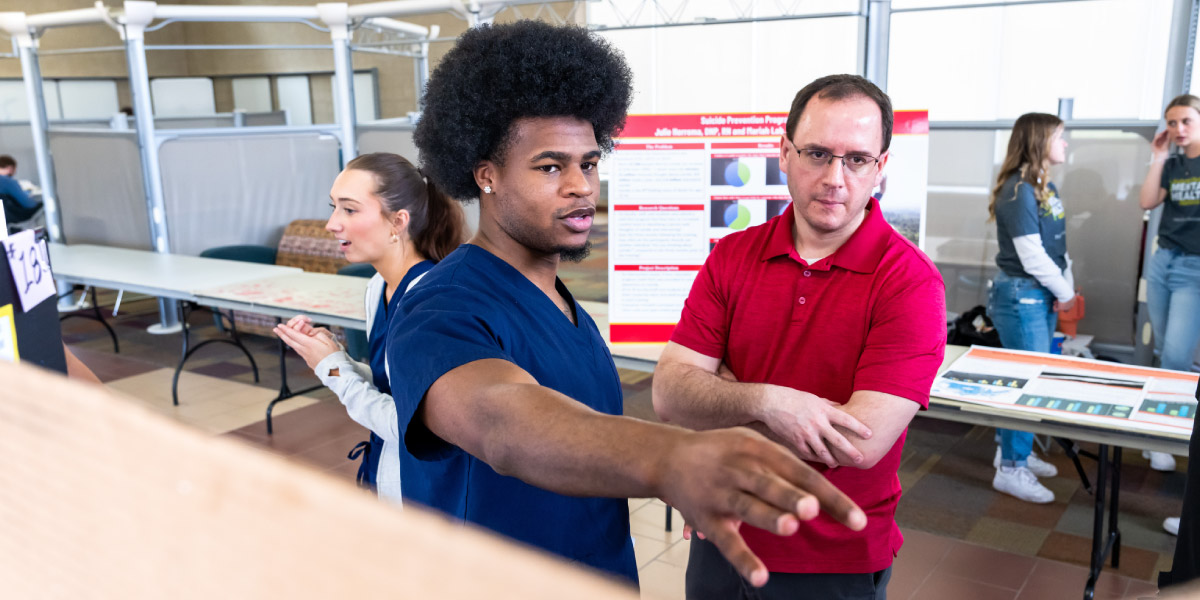 Student working with a Ferris instructor