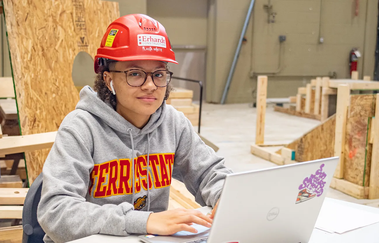 A student working with a computer in the construction lab at Ferris State University