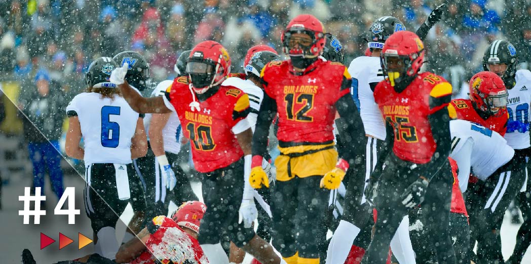 Ferris State football players in snow, number four
