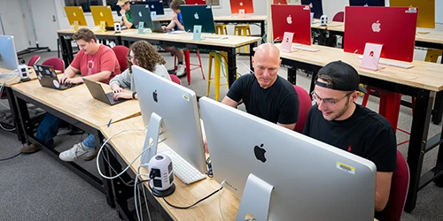 Ferris State University students and faculty in a computer lab