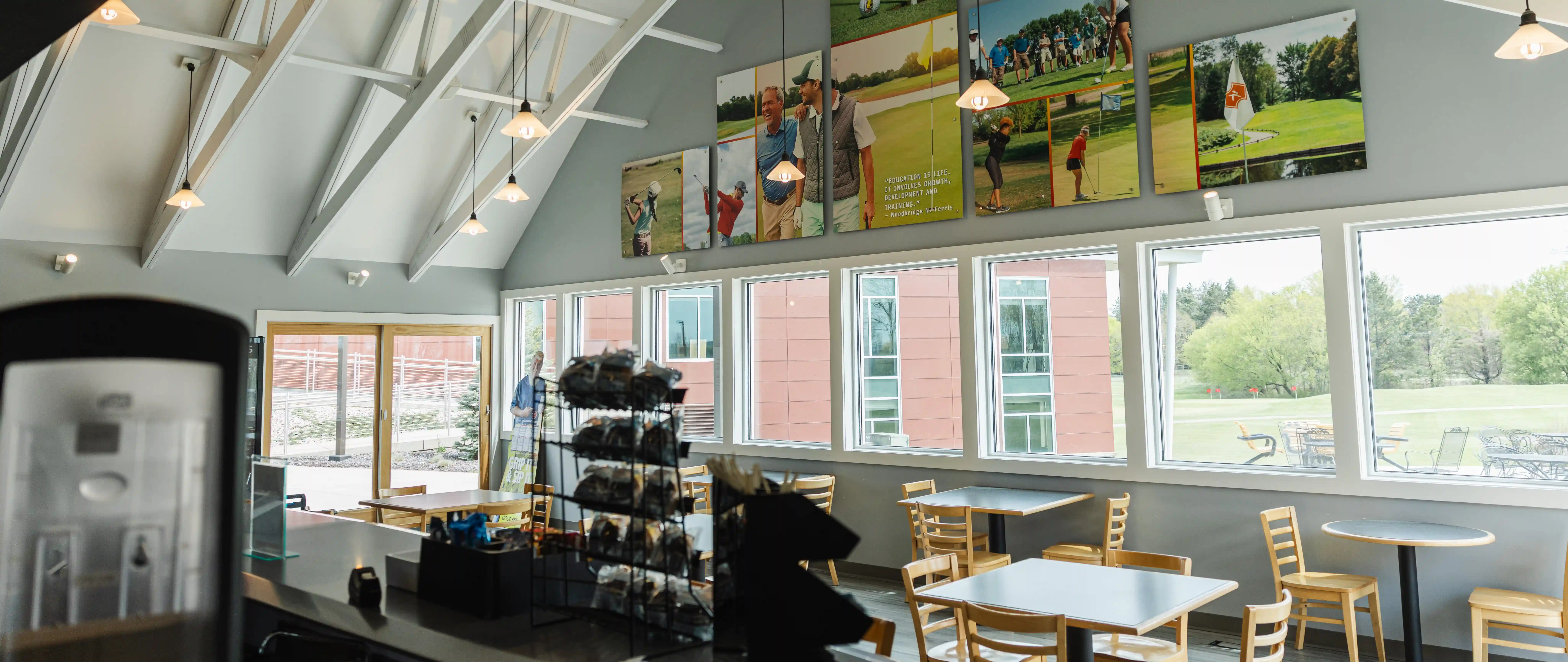 Founders Grille dining tables and mural