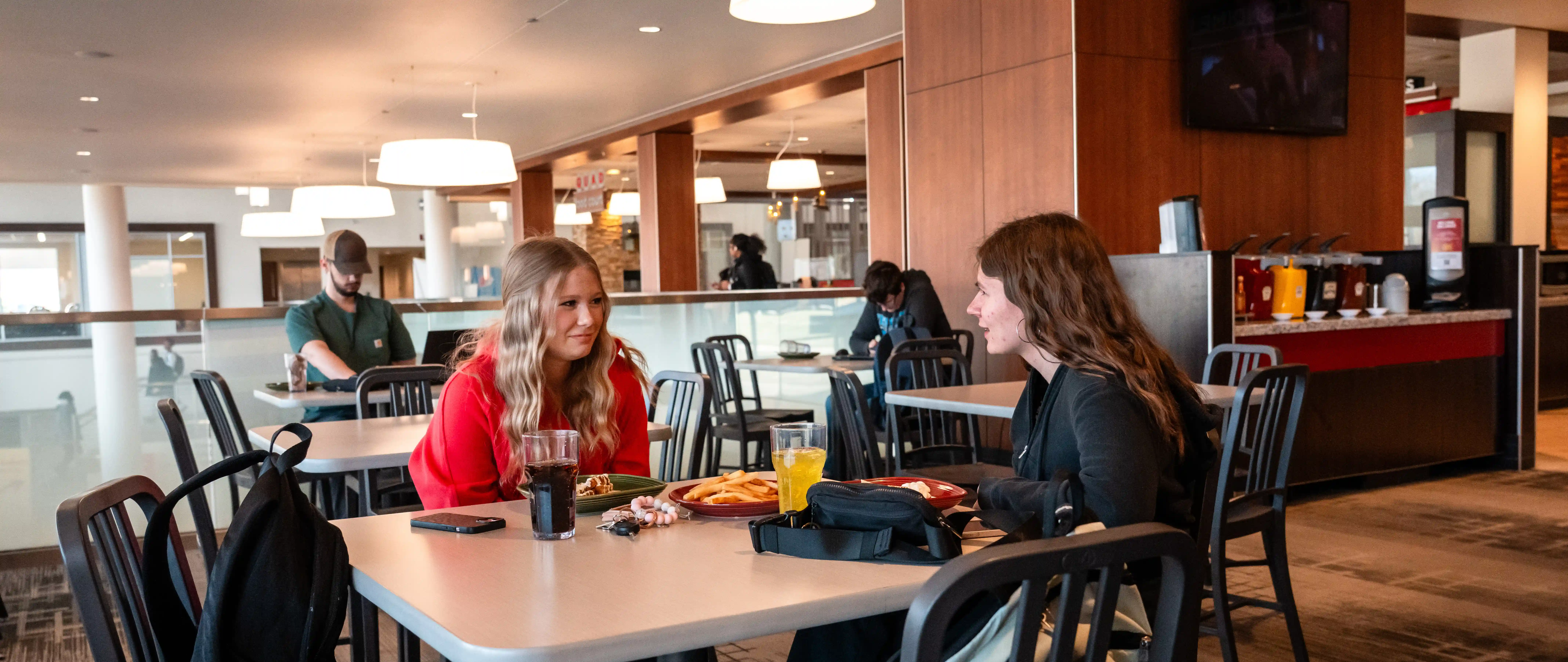 Students sharing fries and food