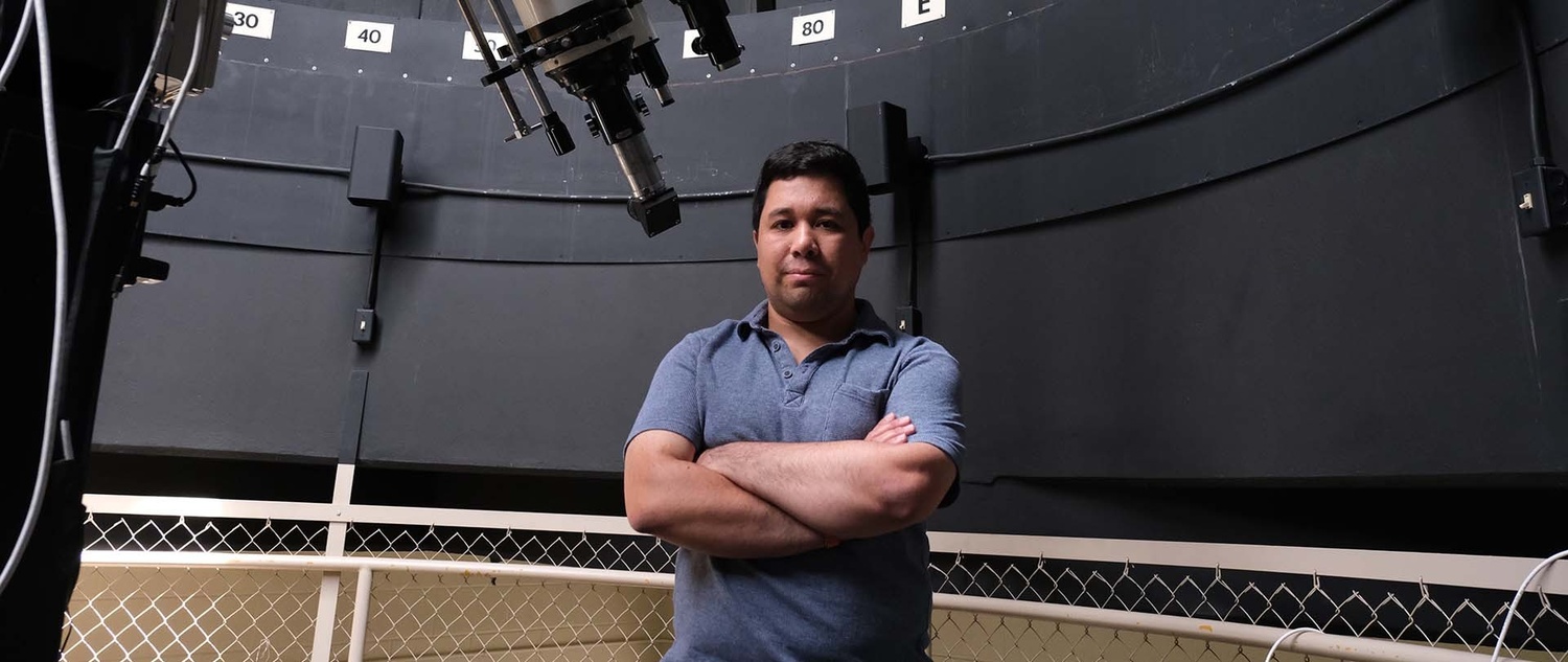 Portrait of Ferris State student Francisco Vasquez inside an observatory