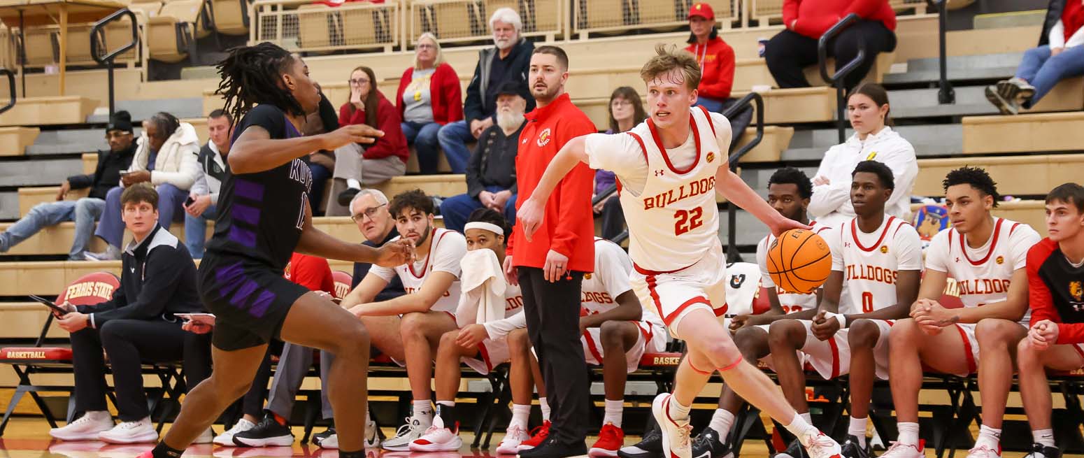 Claerbaut driving past a Kuyper College defender on Nov. 26, 2025