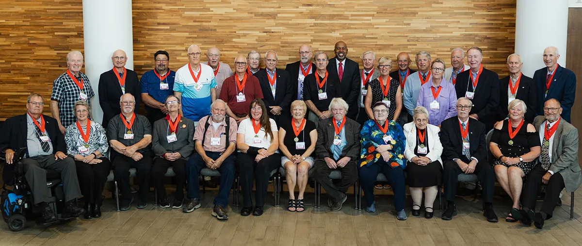 A large group photo of members of the class of 1975