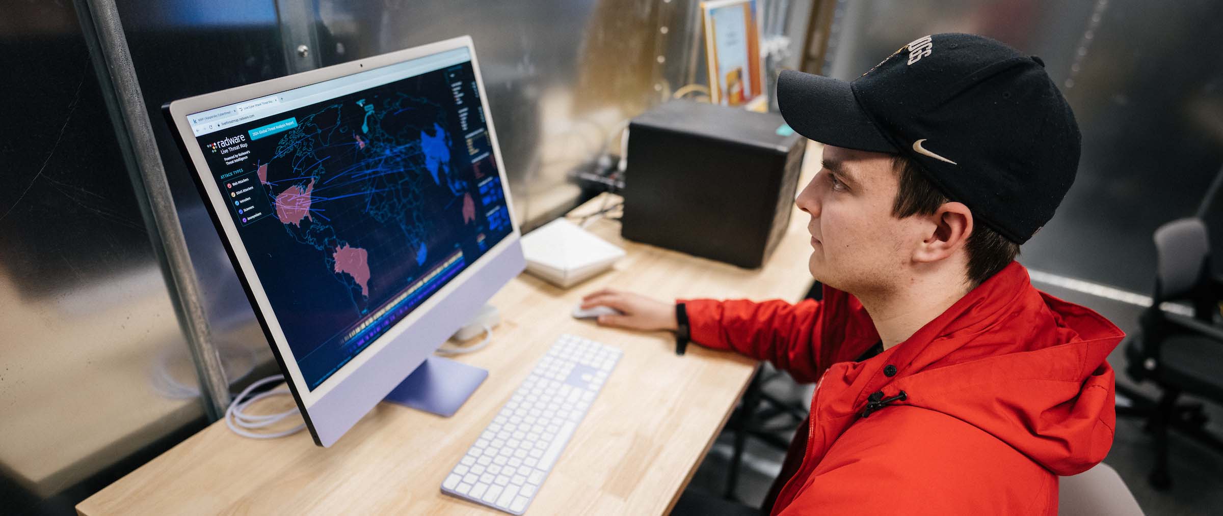 Image of ISI student working on computer during a lab