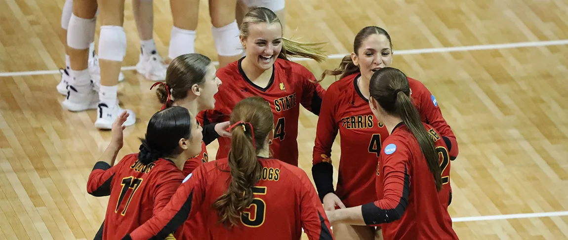 Ferris State volleyball team celebrating