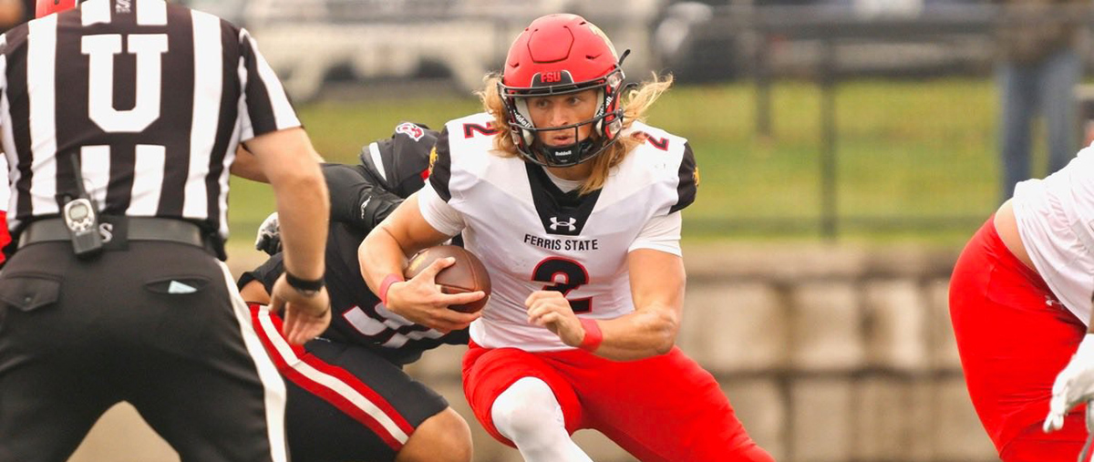 Quarterback Wyatt Bower running with the football.