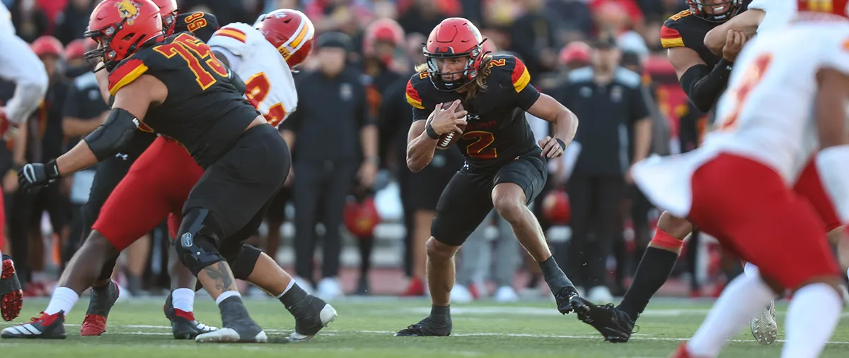 Ferris State quarterback Wyatt Bower running with the football