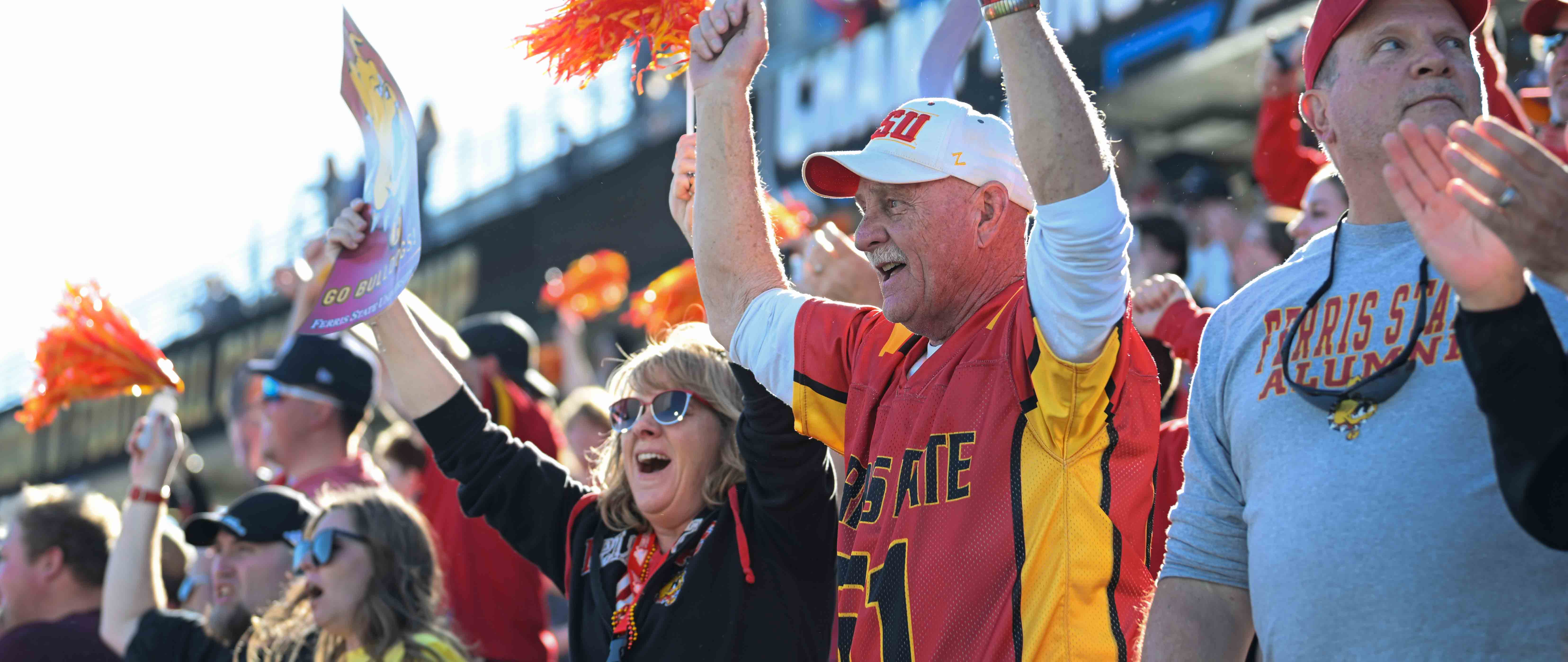 John Sonntag and his partner Tammy Mercer cheering on the Bulldogs at the 2025 national championship game in Texas.