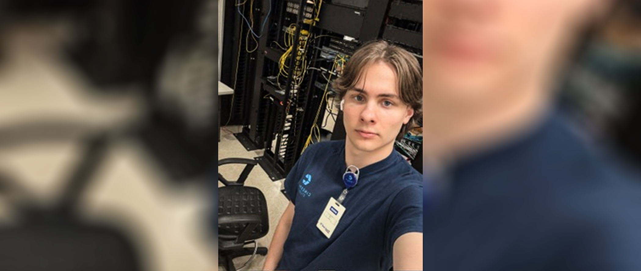 Ferris State student Riley Deloach in a room full of servers during his internship.