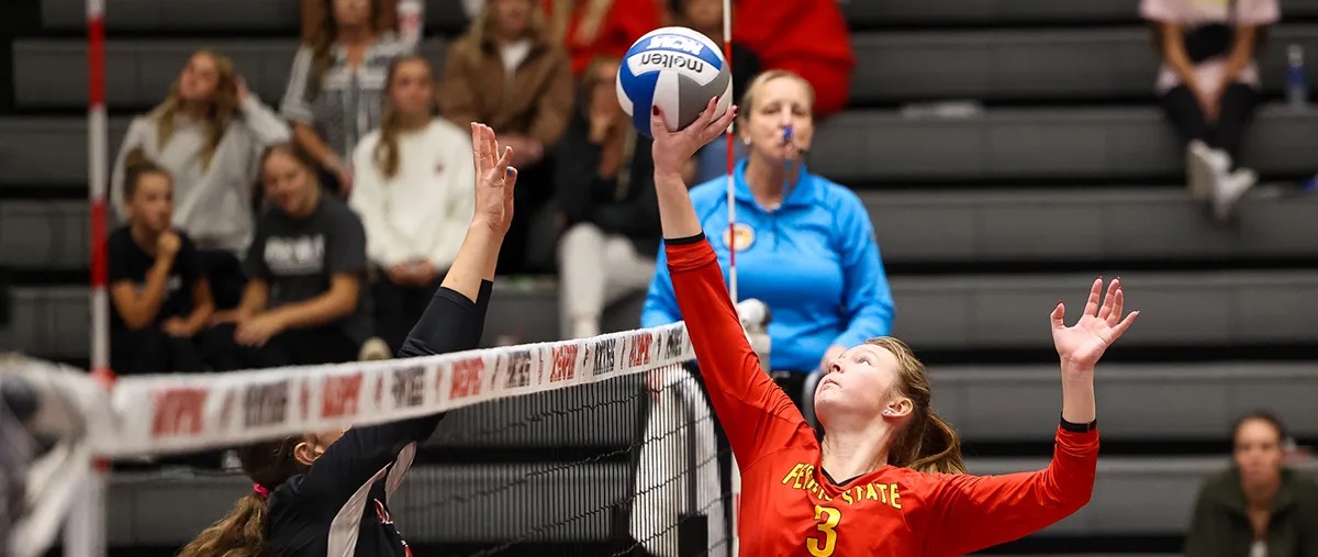 Player setting the ball while on offense.