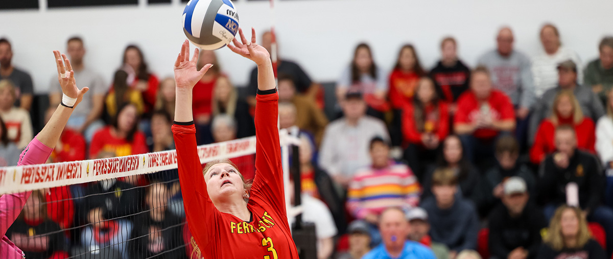 Player setting the ball while on offense.