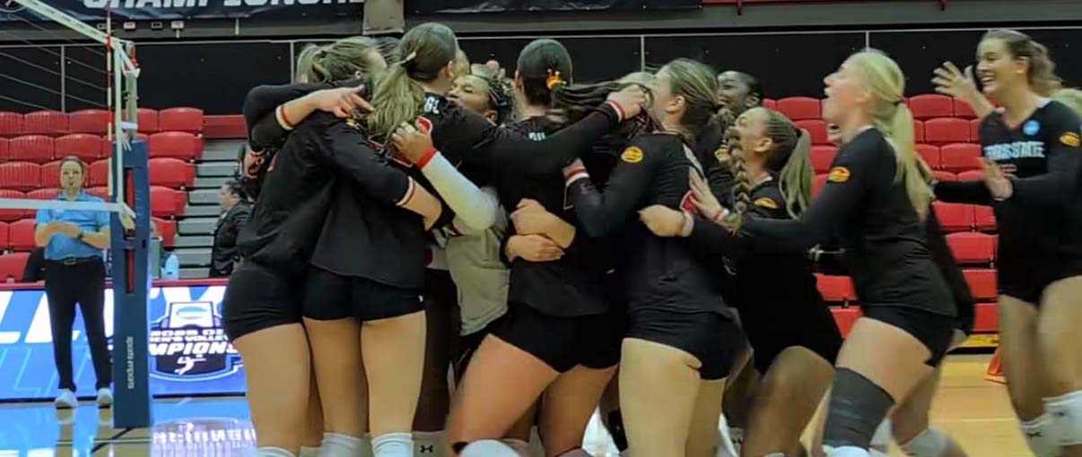Photo of volleyball team celebrating