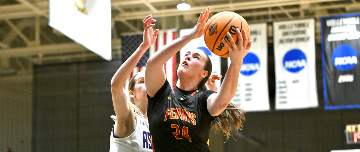 Player attempting to layup a shot.