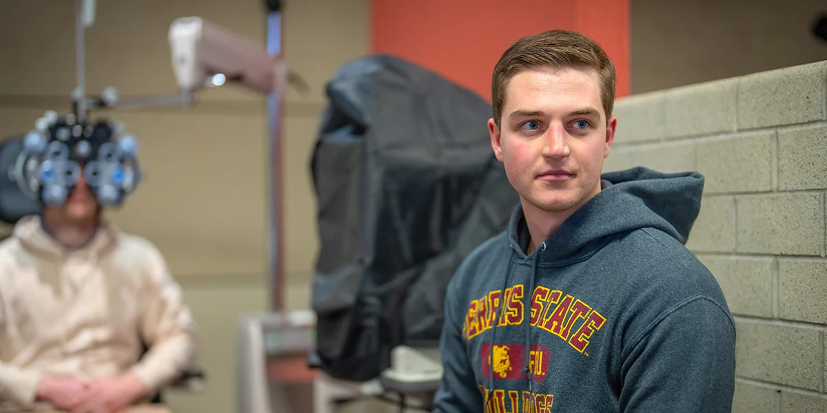 Optometry student performing an eye exam at Michigan College of Optometry at Ferris State University