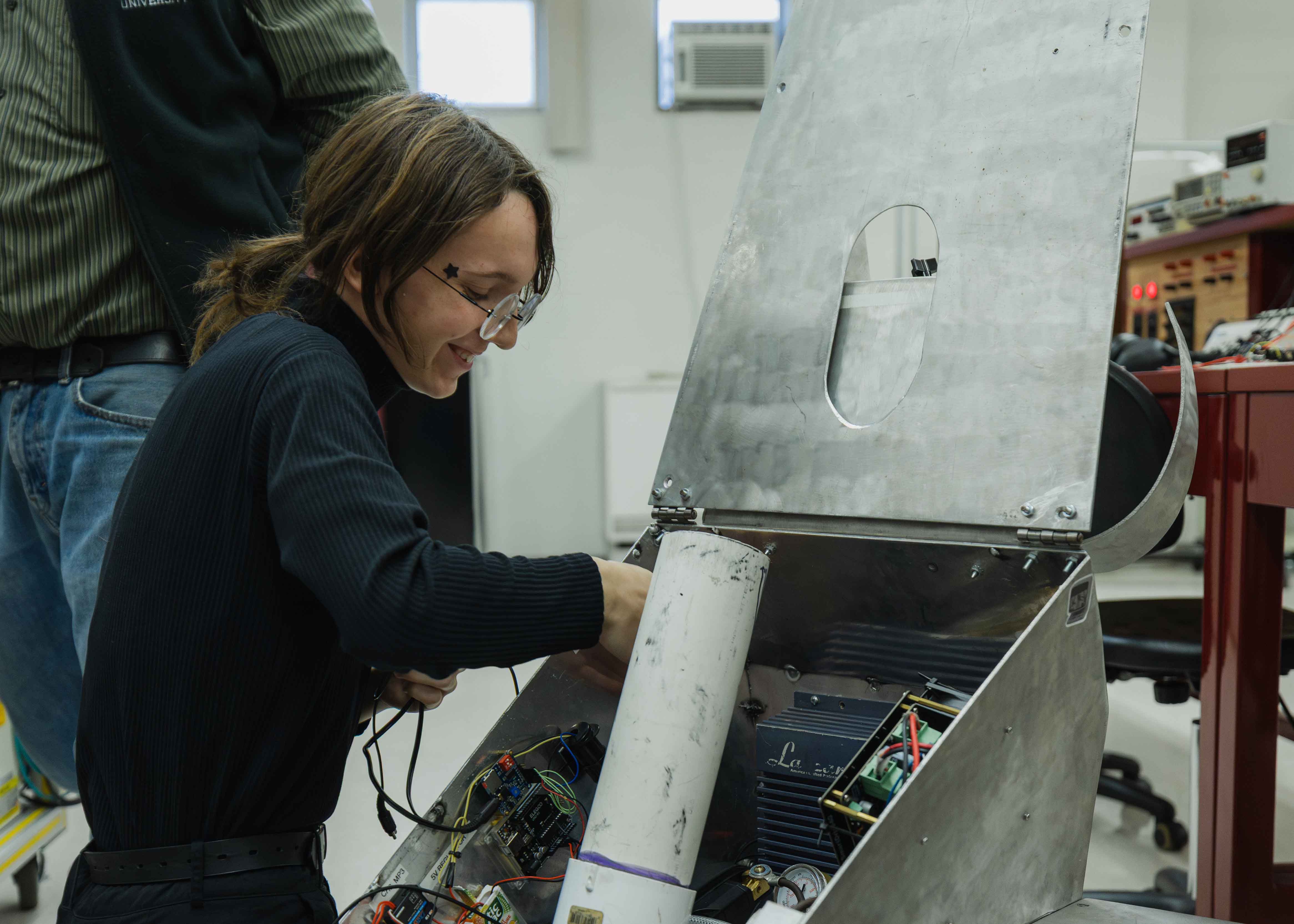 Student working with electrical wiring