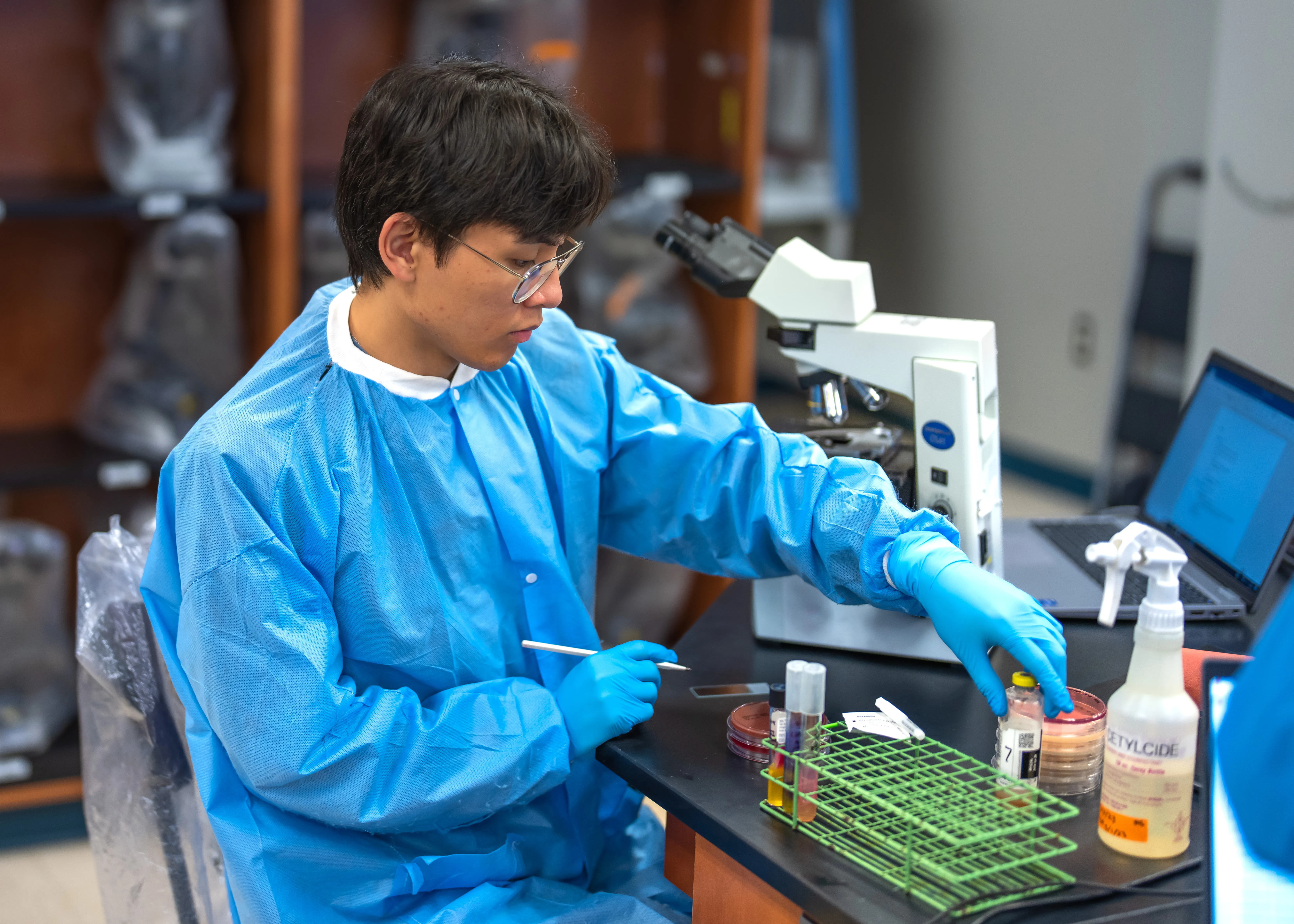Student working in a lab setting