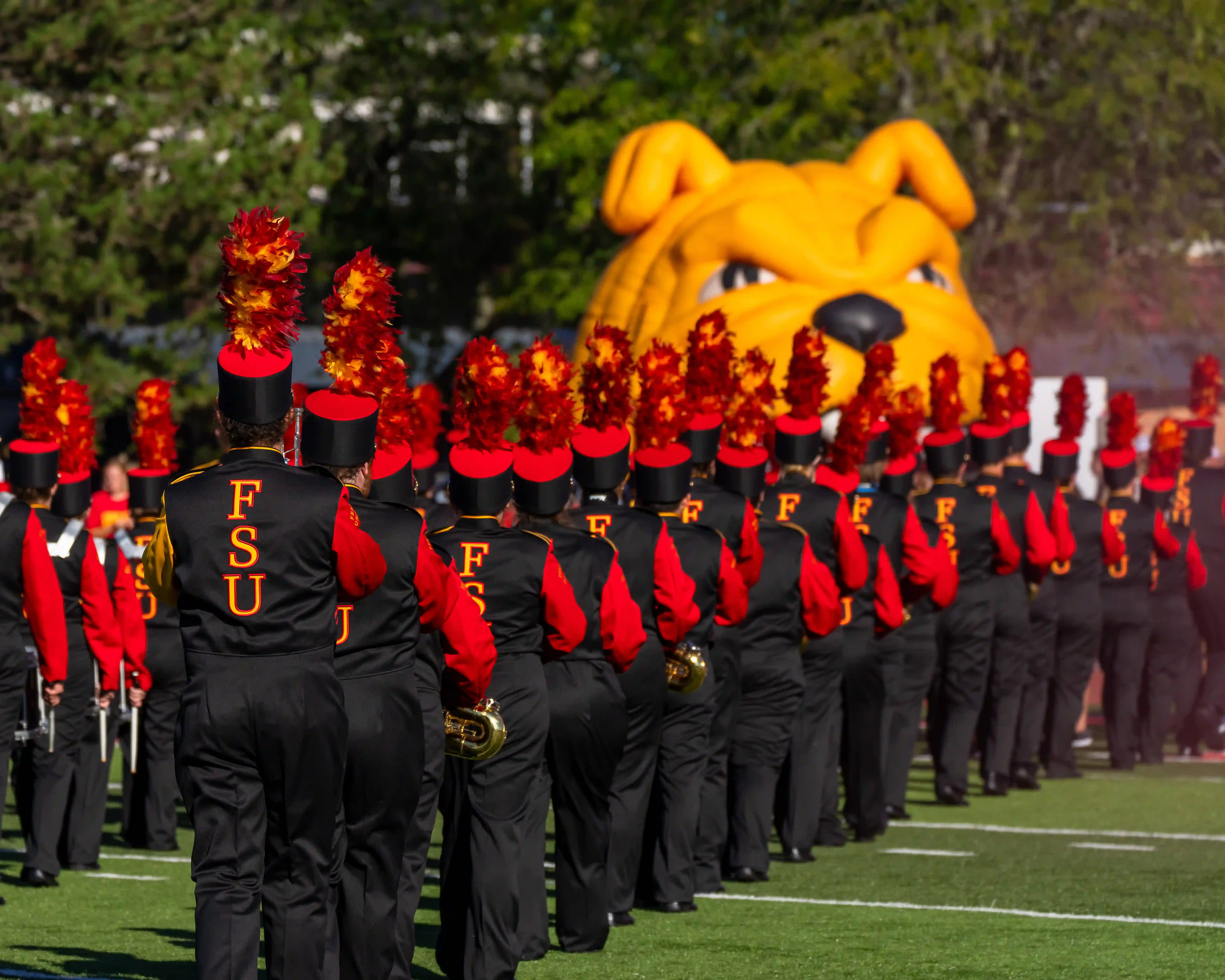 marching band students walking in a line