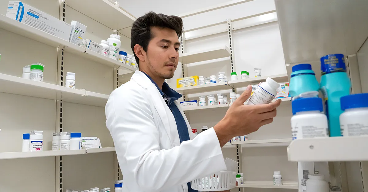 Pharmacy student working with medications at Ferris State University