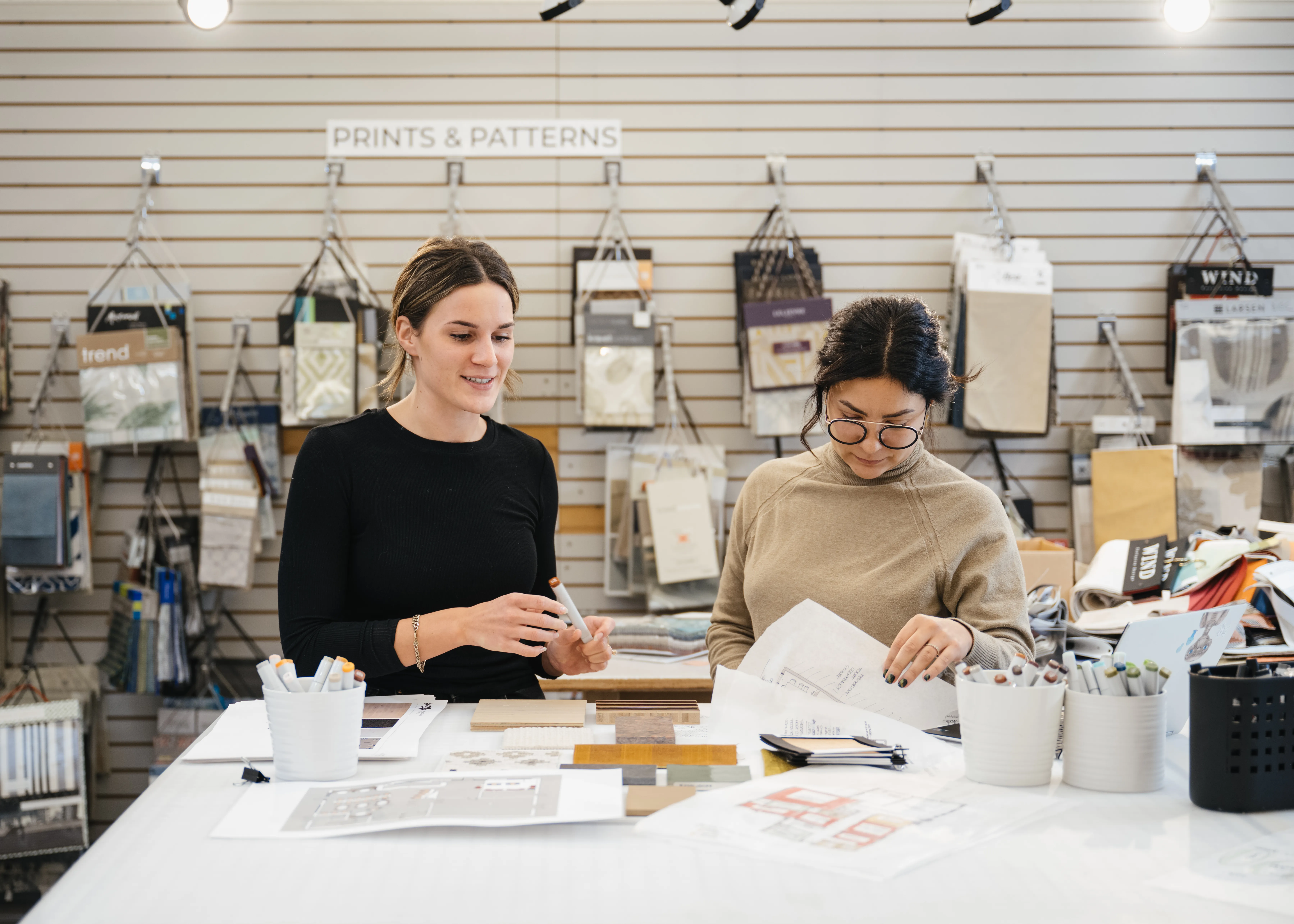 students looking at fabric samples