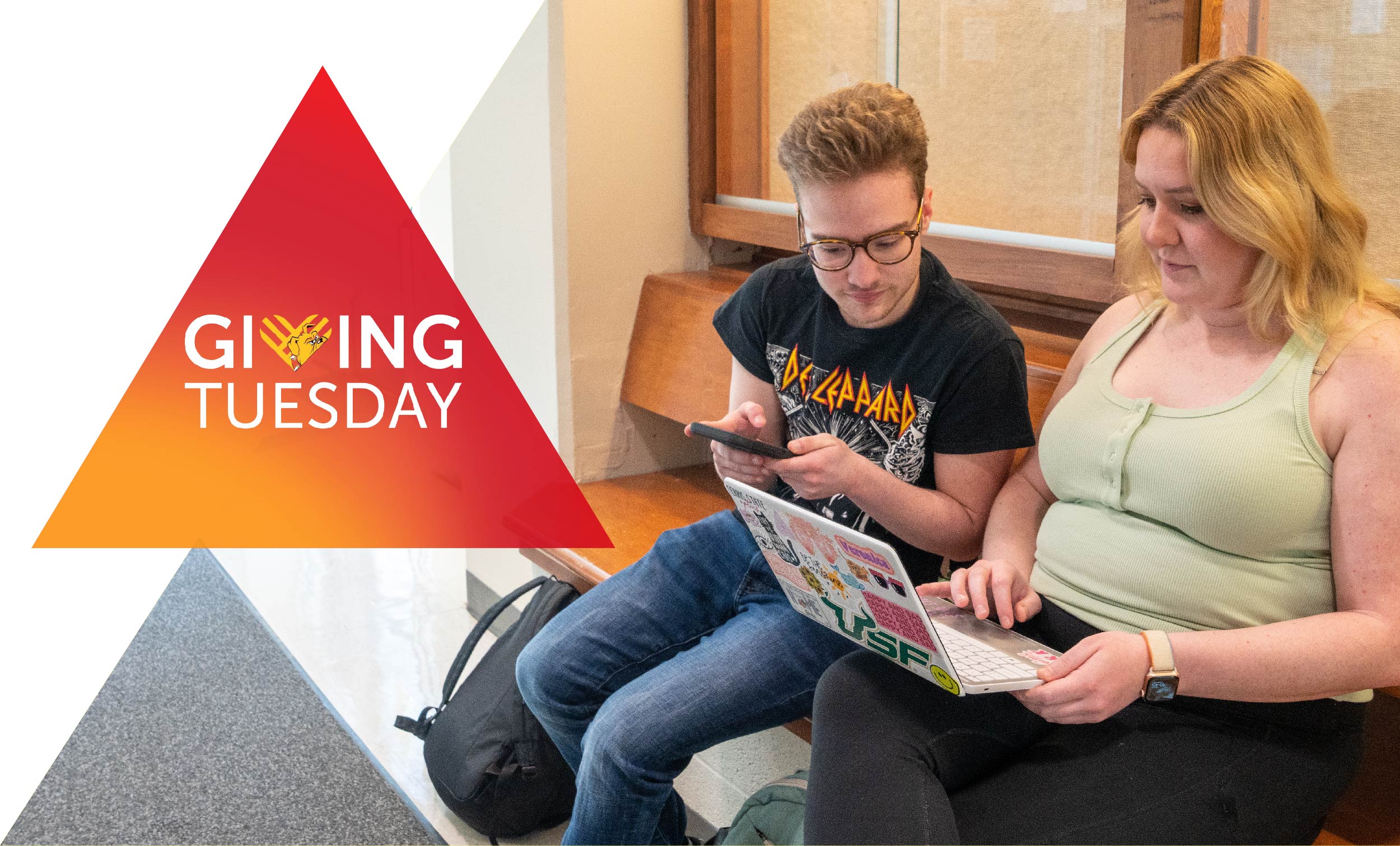 Ferris State University students working on a computer together