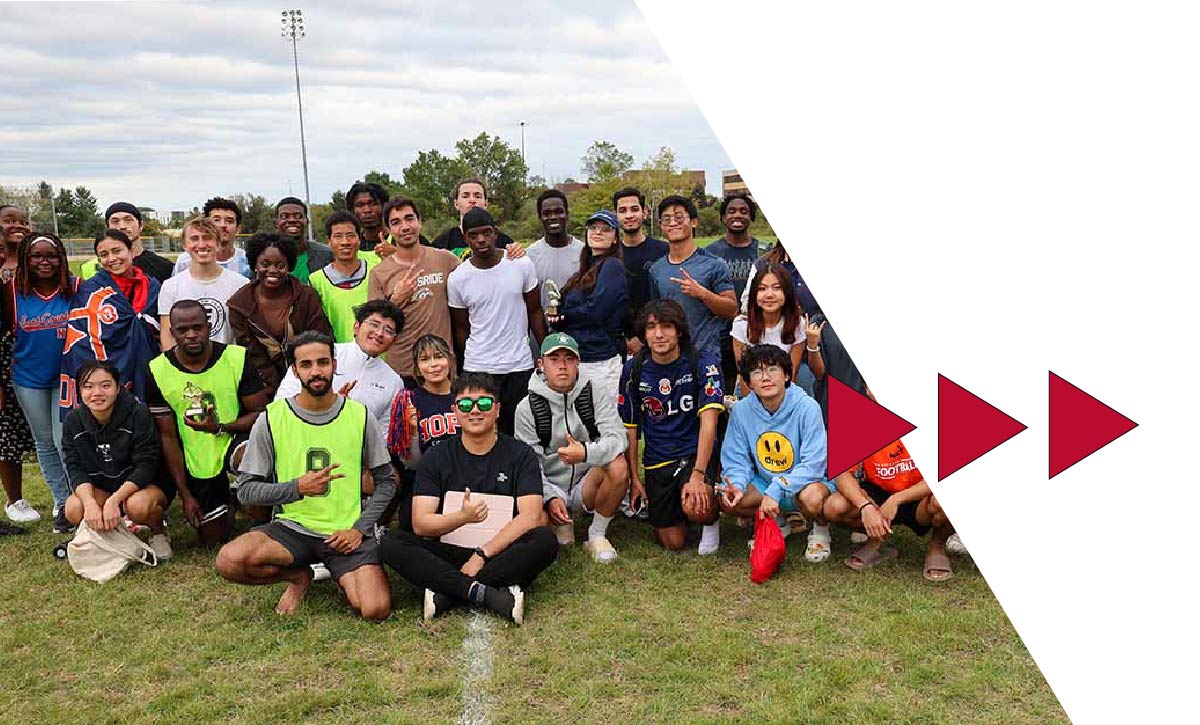 A group of Ferris State University international students attending a team sporting event on campus