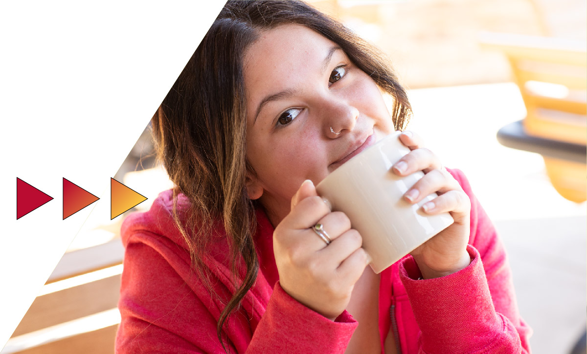 Bulldog student eating at the Rock Cafe on the campus of Ferris State University